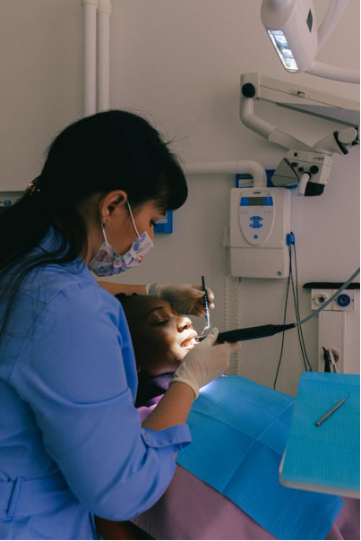 A close-up of a dental check-up in progress.